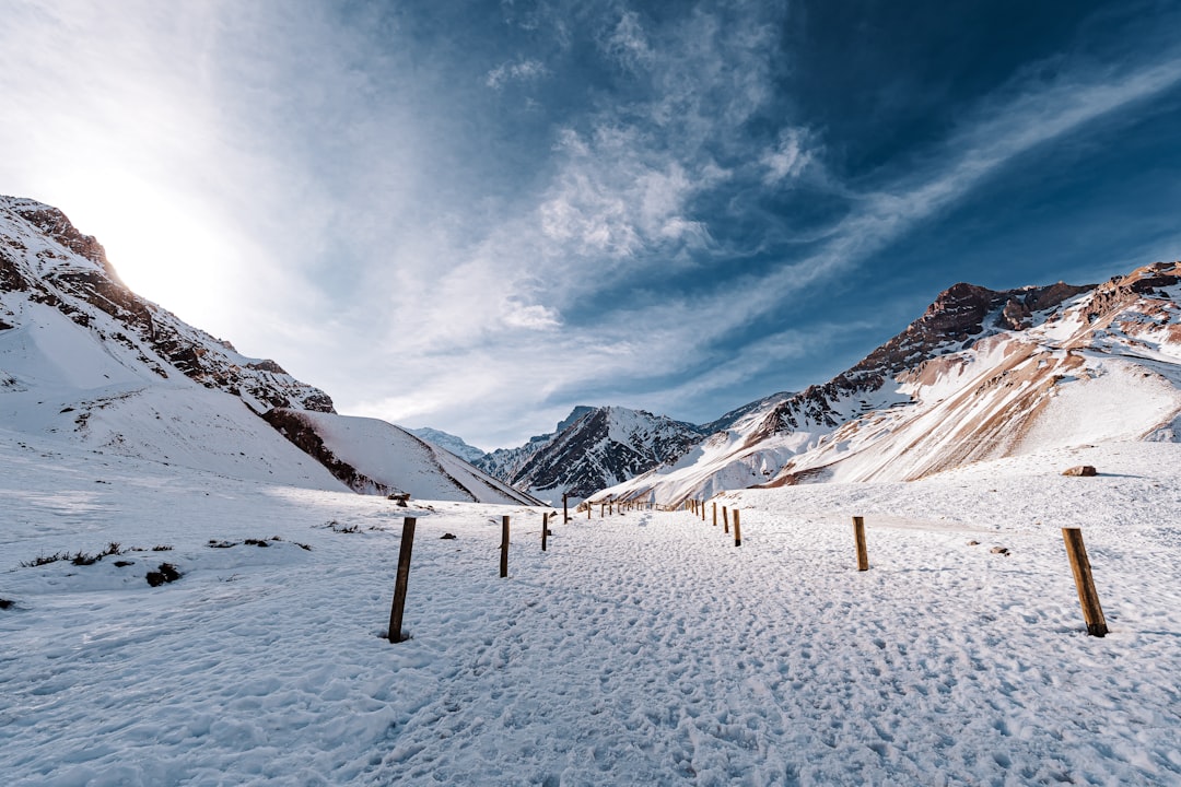 Services snowy-mountain-path-with-wooden-posts-under-blue-sky-zsa0byronc8